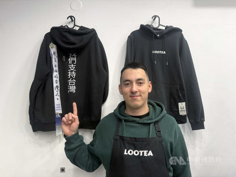 Patrik Dinh with Lootea hoodies and ribbons supporting Taiwan.